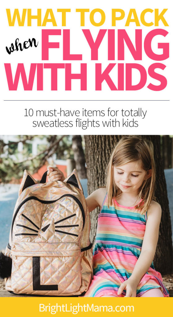 Text reading What to pack when flying with kids over an image of a girl with a backpack